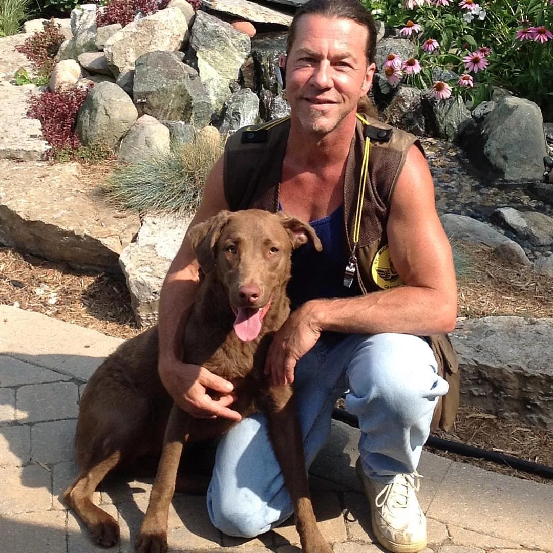 Mike with a Labrador